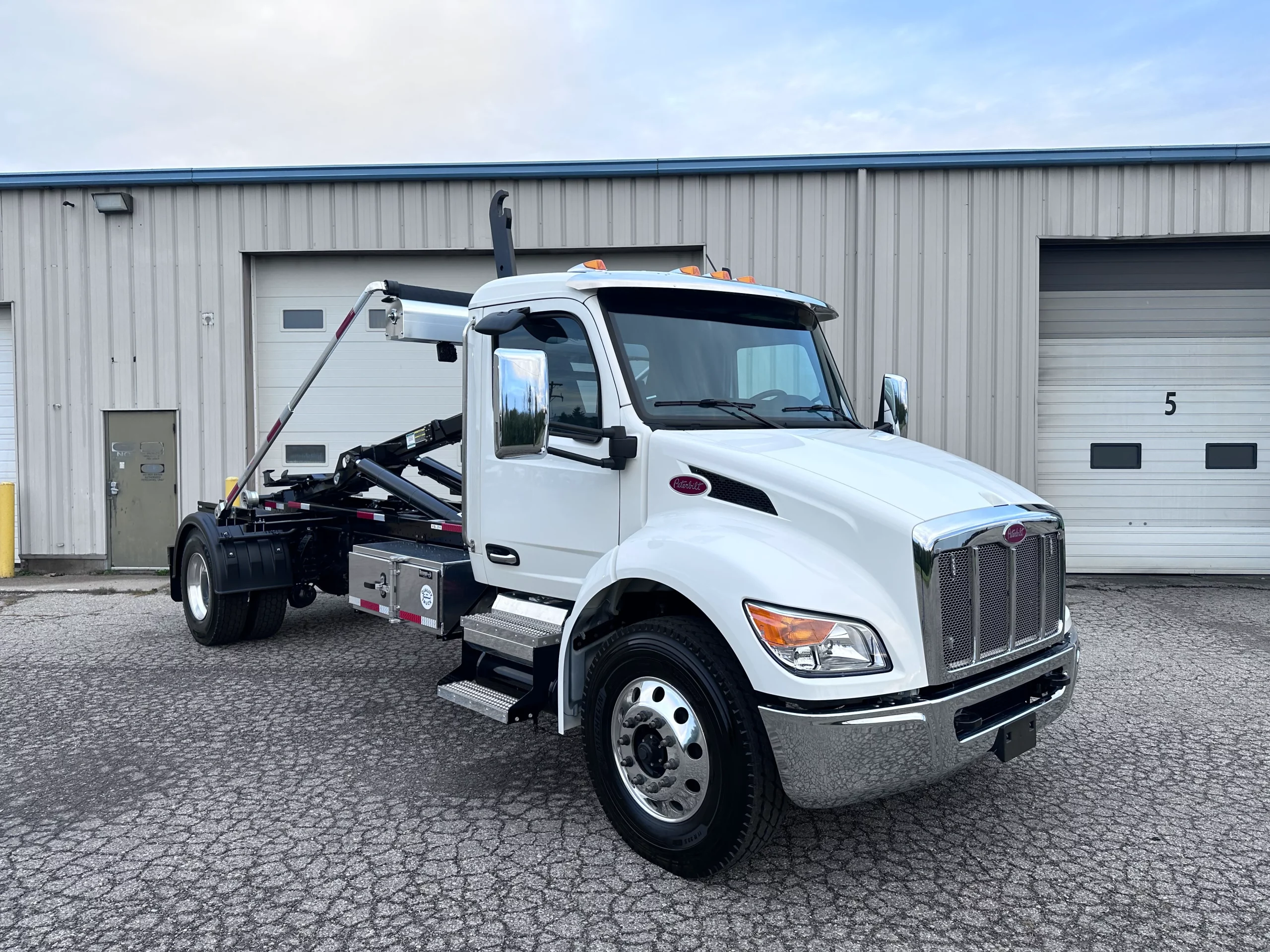 NEW 2026 Peterbilt 536 Hooklift Truck - image 1 of 6