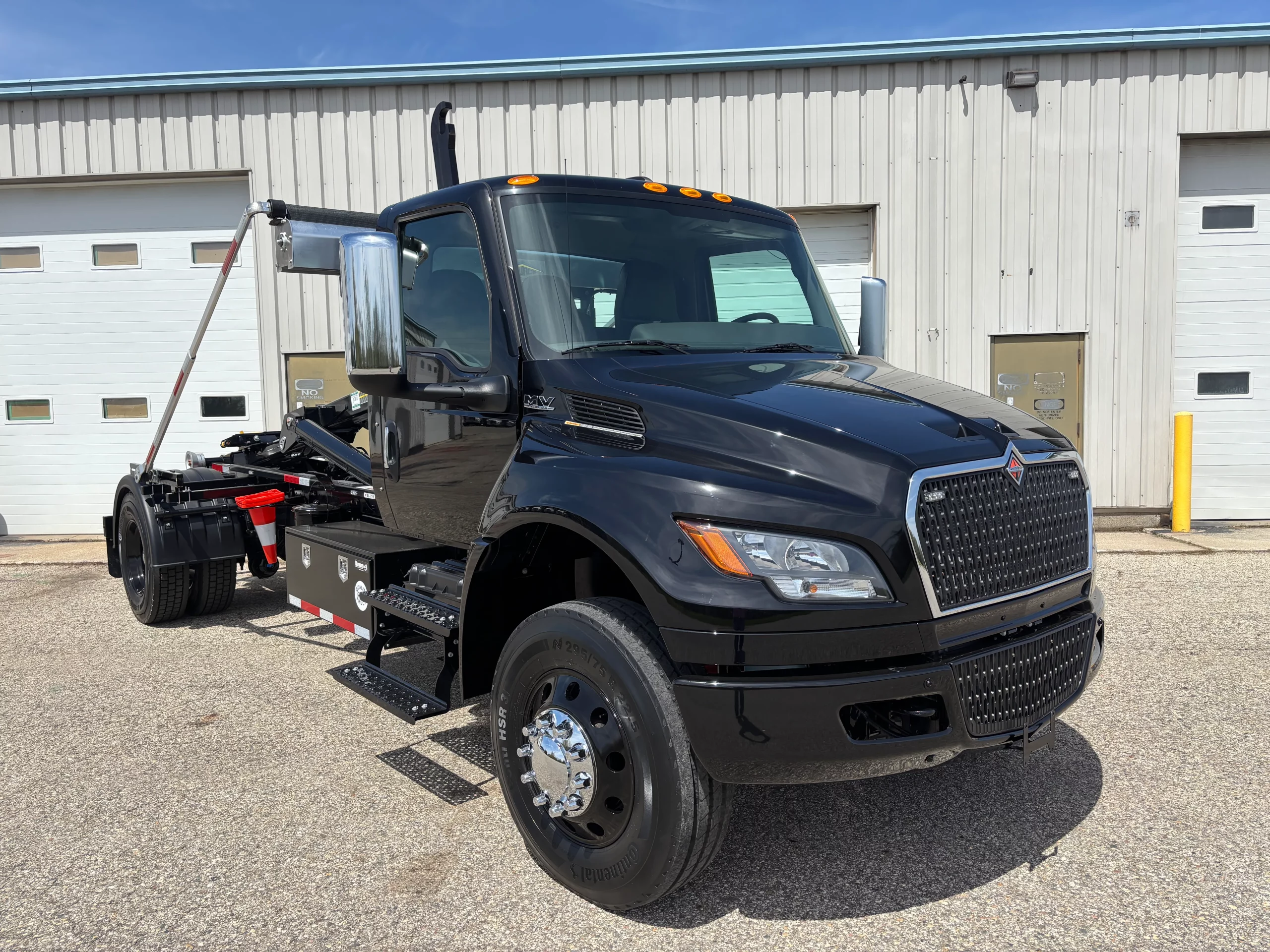 New 2026 International Mv Hooklift Truck Black Out NEW 2026 International MV Hooklift Truck BLACK OUT - image 1 of 6